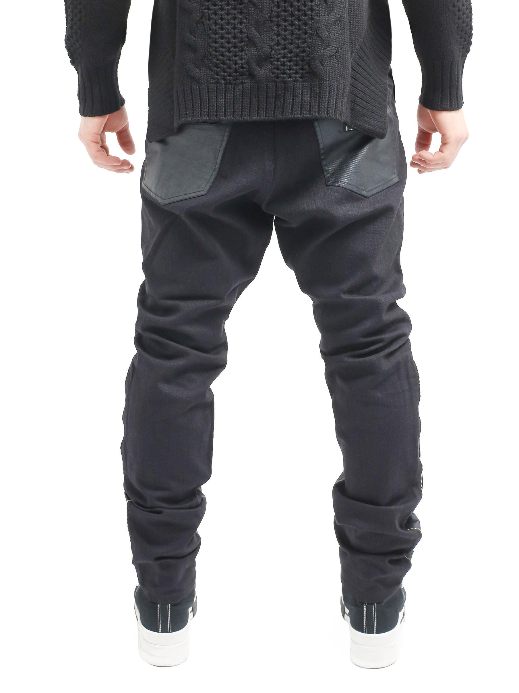 BLACK JEANS WITH LEATHER DETAILS AND SILVER ZIPS